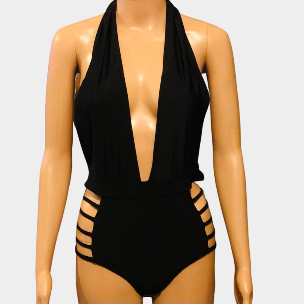 NWOT Black one piece swimsuit with plunging neckline. Halter tie.Open back